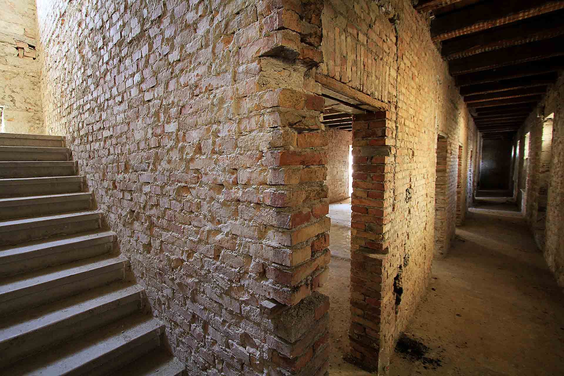 Eerie photograph of a ruined stairway and hallway in the future Almayer Hotel's main building in Zadar, Croatia, before reconstruction in 2015.